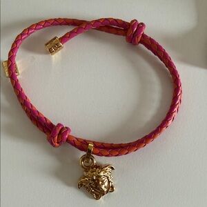 Versace Braided Bracelet in Pink and Orange with Gold Medusa Charm